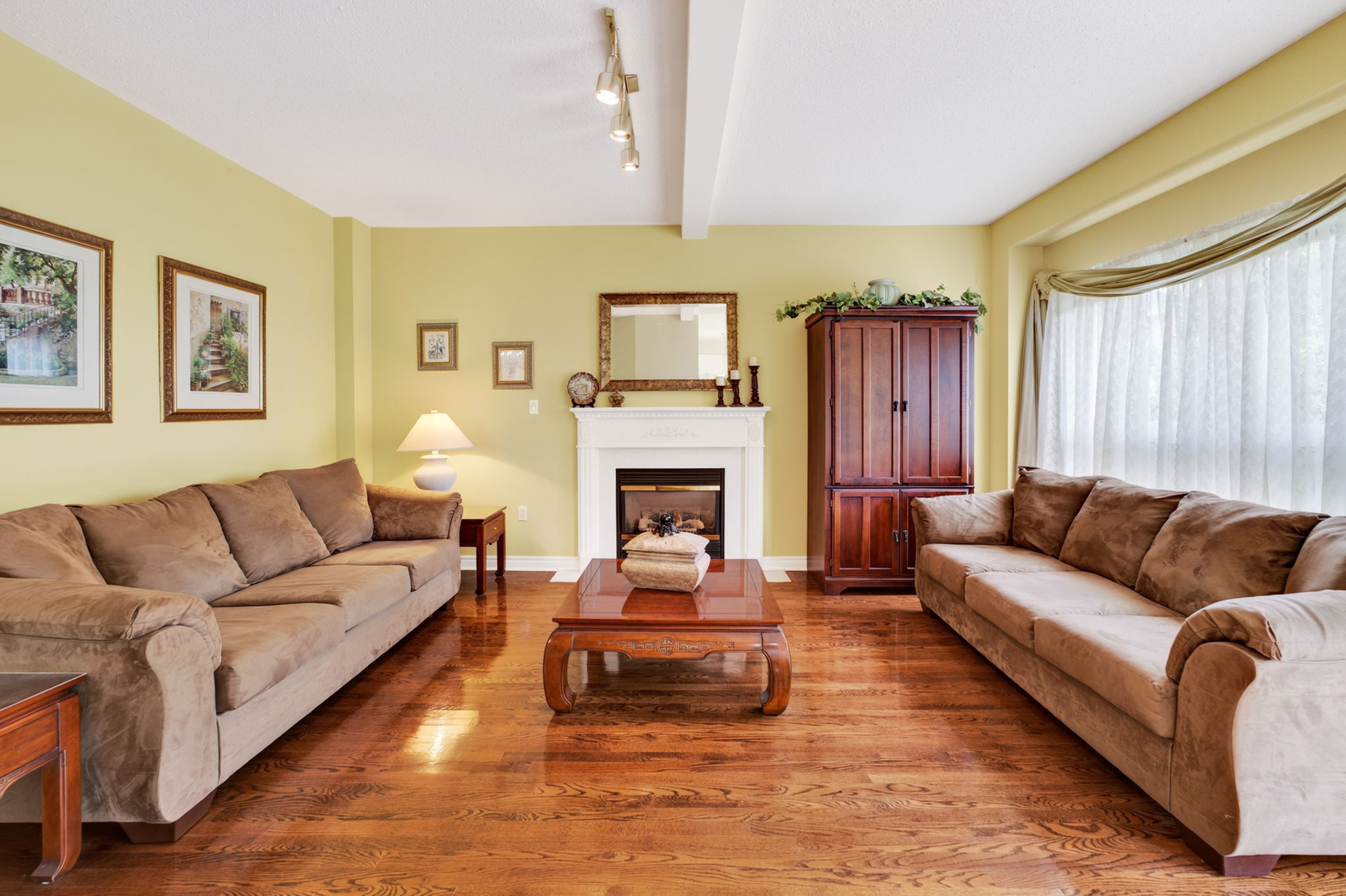 Living room with fireplace wide